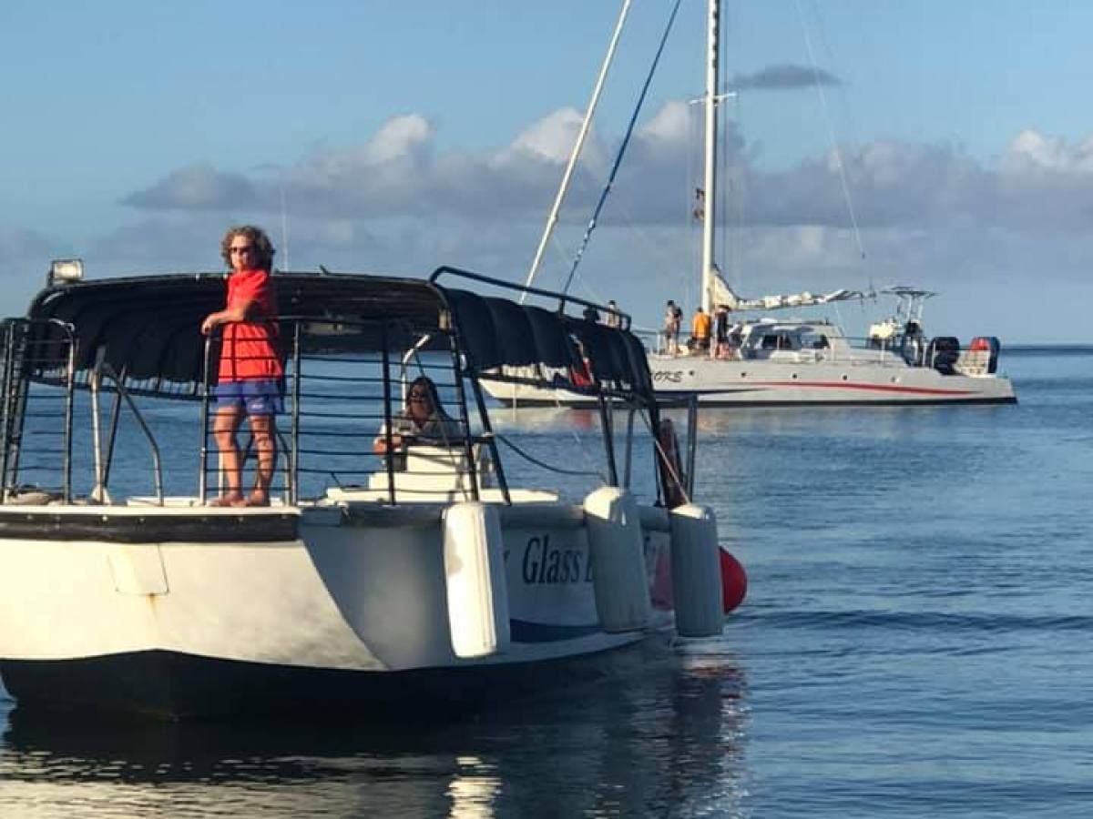 a small boat in a large body of water